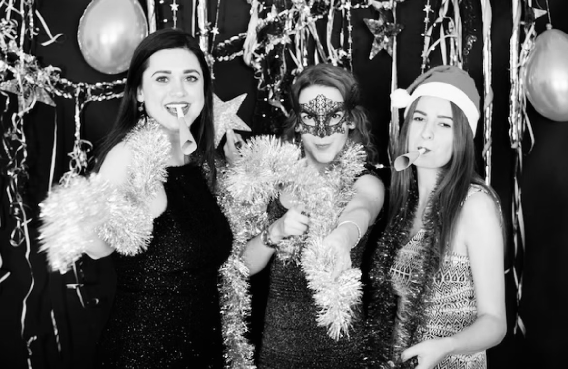 New Year's Eve celebration with masks and props